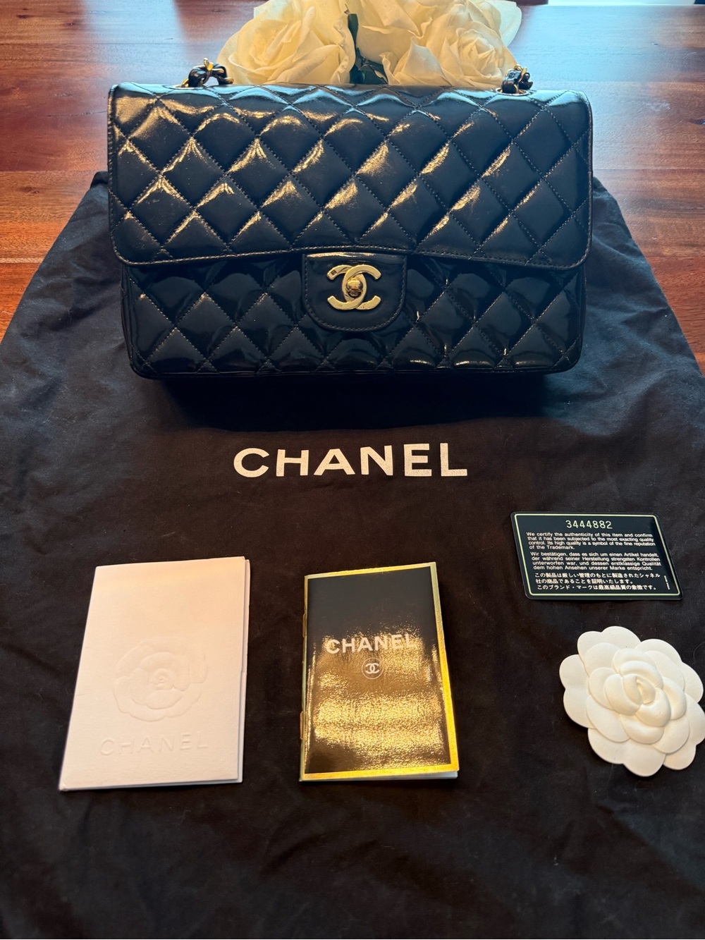 CHANEL Black Quilted Patent Leather Classic Flap Wallet on Chain